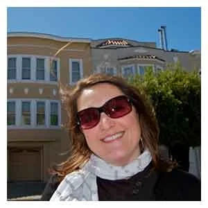 Testimonial portrait published by the manufacturer, captioned Angela Burke