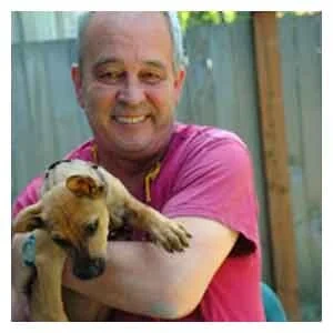 Testimonial portrait published by the manufacturer, captioned John Peterson